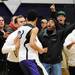 Spectators direct Pioneer High School's Jibreel Hussein to walk away after a heated exchange on the court following the game at Pioneer on Tuesday, Feb. 19, 2013. Melanie Maxwell I AnnArbor.com